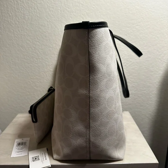 Authentic Coach White and Black Large Tote Bag with a Matching Zip Wristle